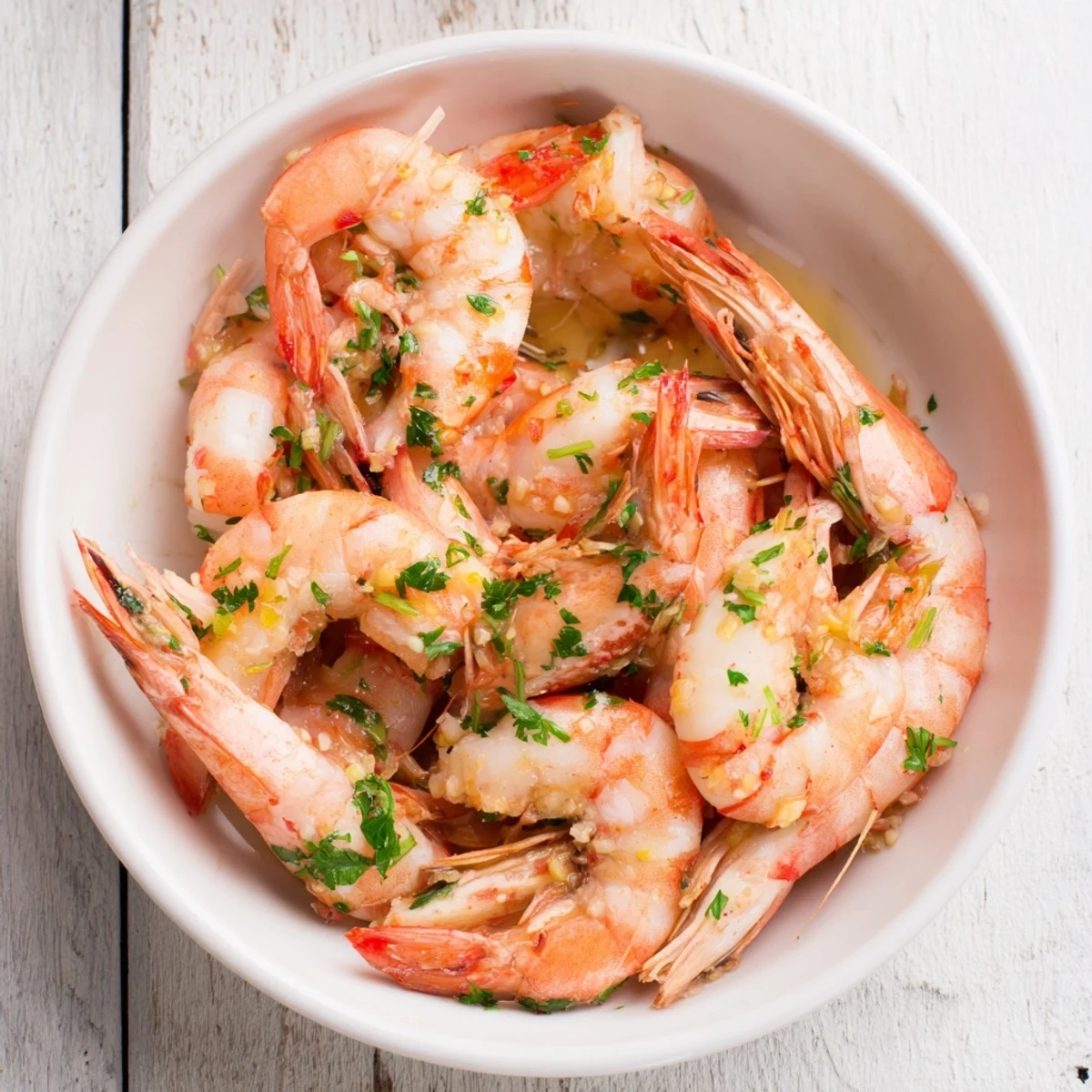 Vibrant Light & Bright Lemon Herb Shrimp Scampi, swimming in a glistening lemon-herb sauce, is ready for a taste!