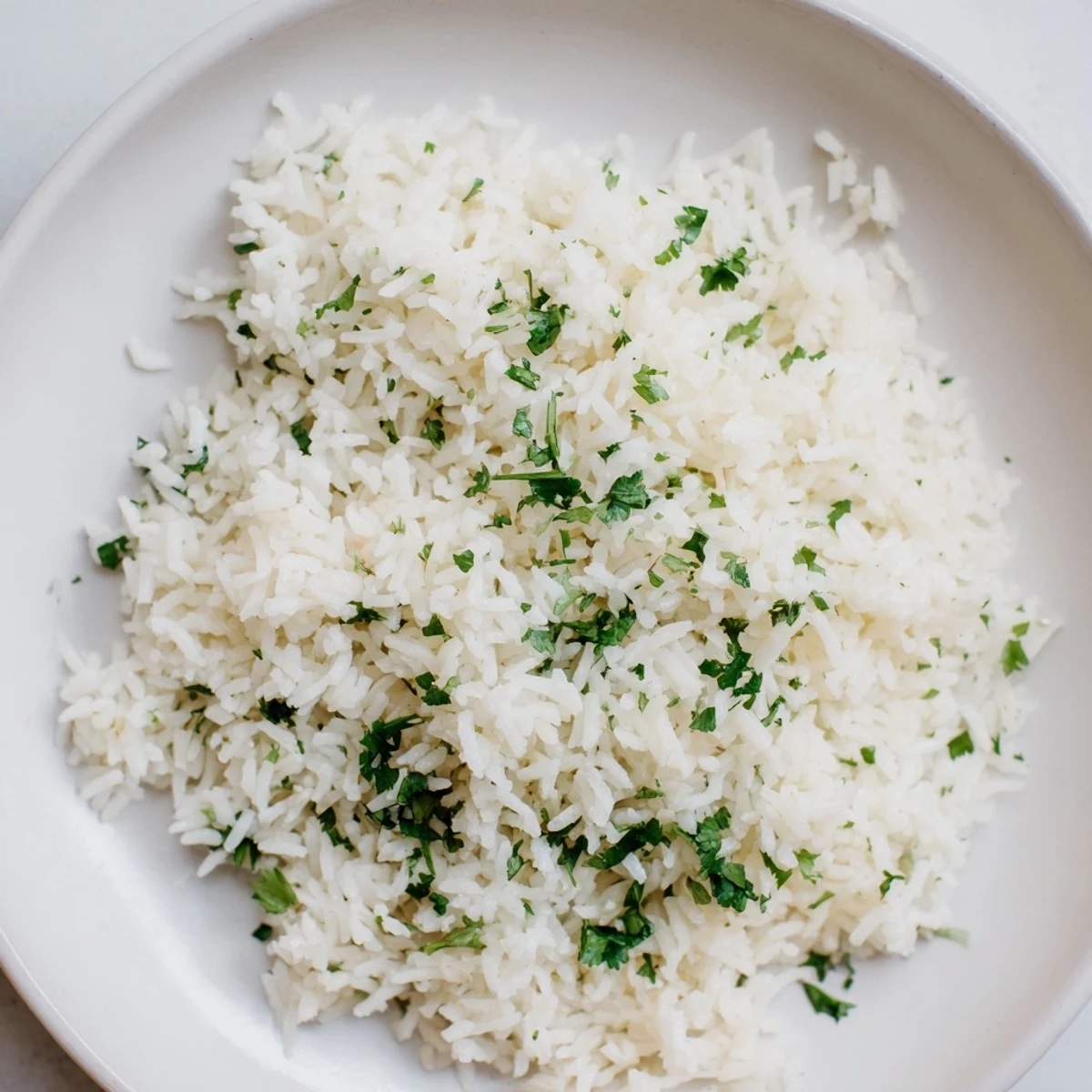 Fluffy Cilantro Lime Rice: A vibrant side of rice with fresh cilantro and bright lime zest.