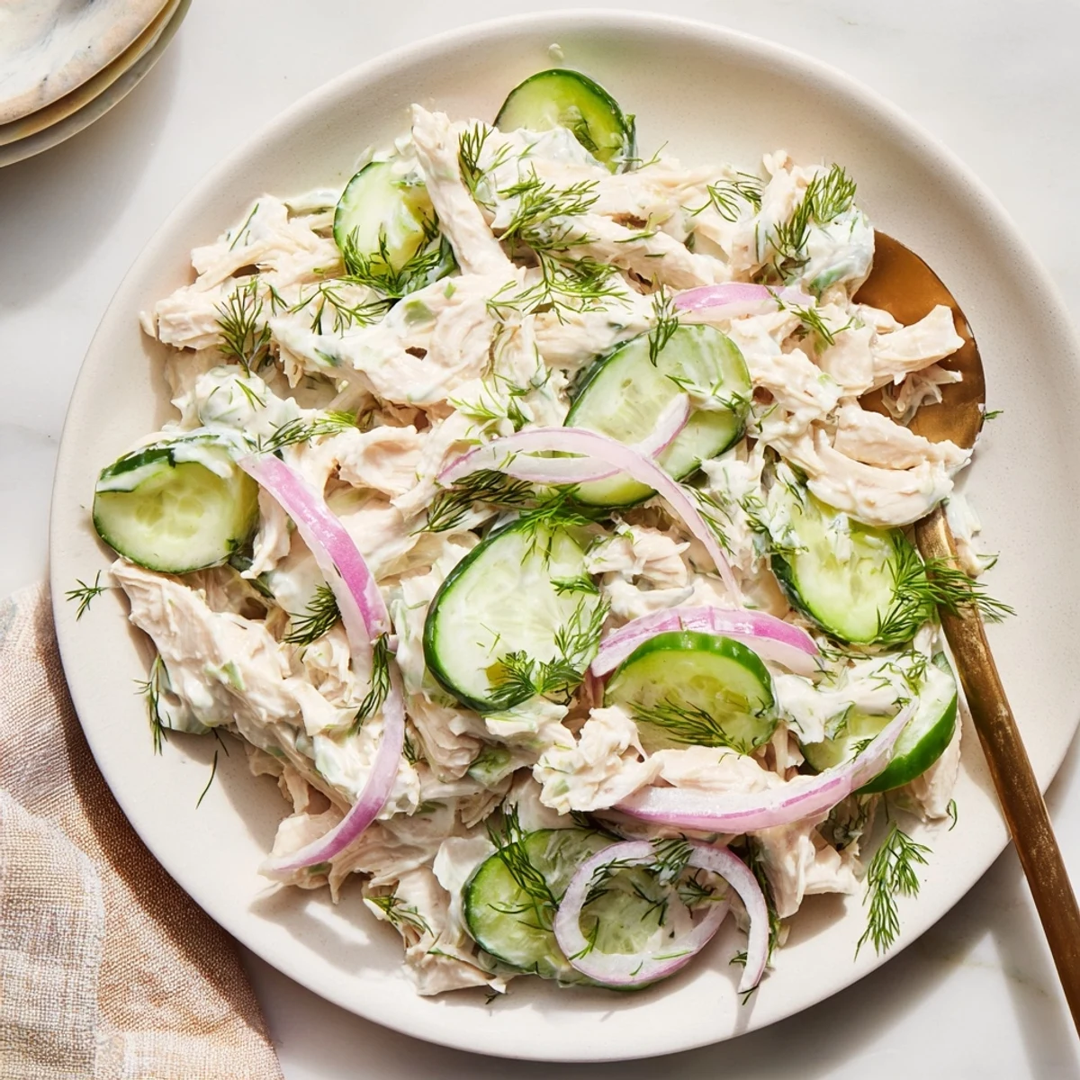Creamy Cucumber Chicken Salad features juicy diced chicken, crunchy cucumbers, and creamy Greek yogurt dressing with herbs.
