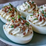 Deviled eggs loaded with creamy filling and everything bagel seasoning, ready to serve.
