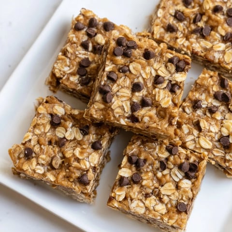 A close-up of Peanut Butter Banana Oat Bars, offering a satisfying, no-bake energy snack.