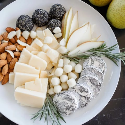 A lavish The Silver Screen cheese and chocolate board arrangement, perfect for movie night gatherings.