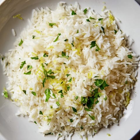 This photo shows a bowl of Cilantro Lime Rice, ready to serve with your favorite tacos tonight.