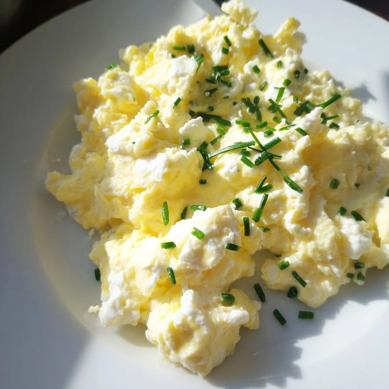 Visualize these delicious Cottage Cheese Scrambled Eggs, soft and savory, perfect with toast.